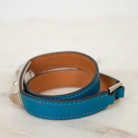 Blue leather bracelet on a marble surface