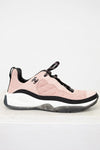 Pink sneaker with black accents on a white background