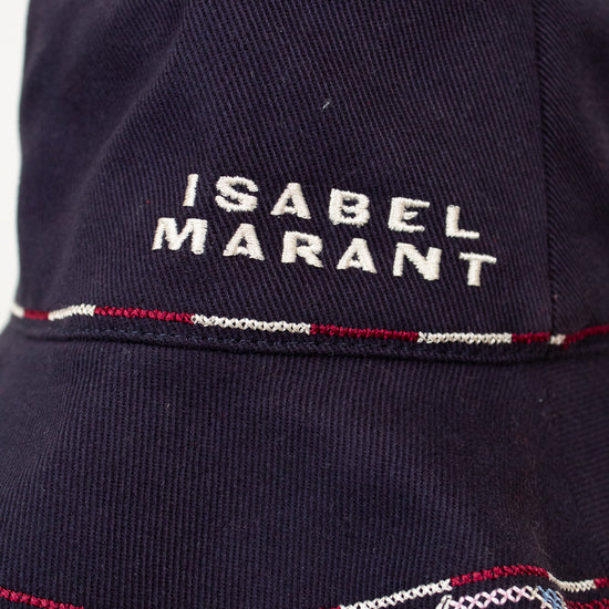 Navy blue bucket hat with 'Isabel Marant' branding on a white background