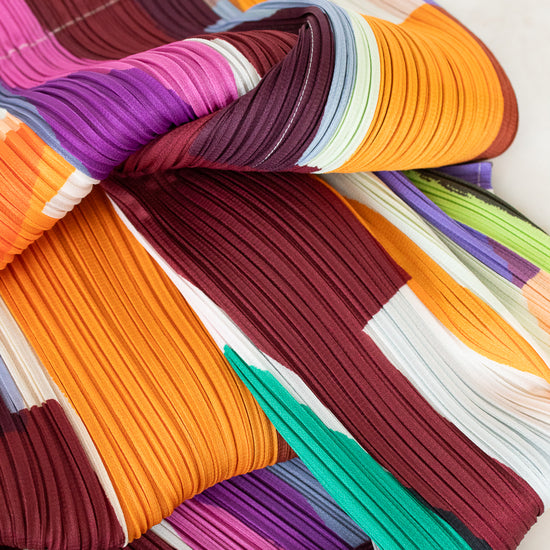Colorful ribbons in various patterns and colors on a white background