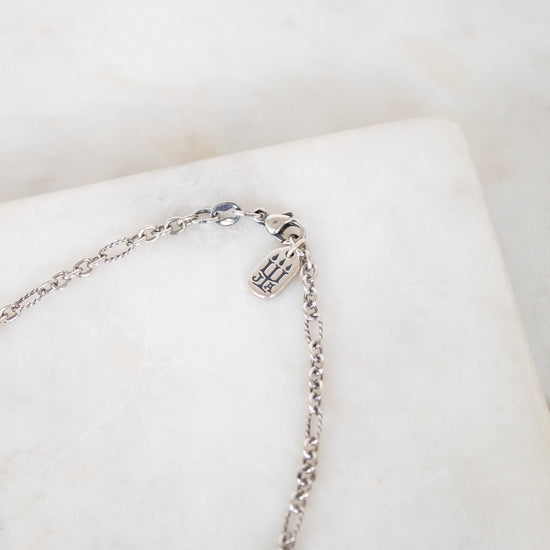 Brand logo on chain on white background