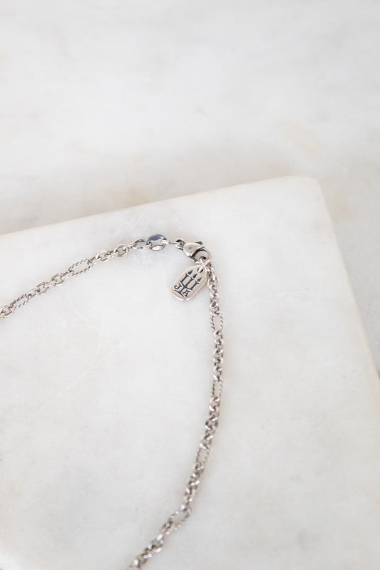 Brand logo on chain on white background