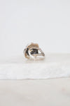Silver ring -back view - on a white surface