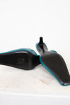 Black soles on shoes on a white background
