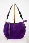 Purple handbag with black strap on a white background