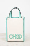 A structured mini tote bag with a cream-colored front panel and mint green trim, handles, and logo lettering, displayed on a light marble surface against a white background.