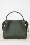 Green handbag with a handle on a white background