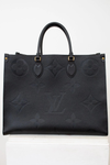Black handbag with brand logo on a white background