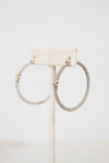 Silver hoops with gold accent on white background