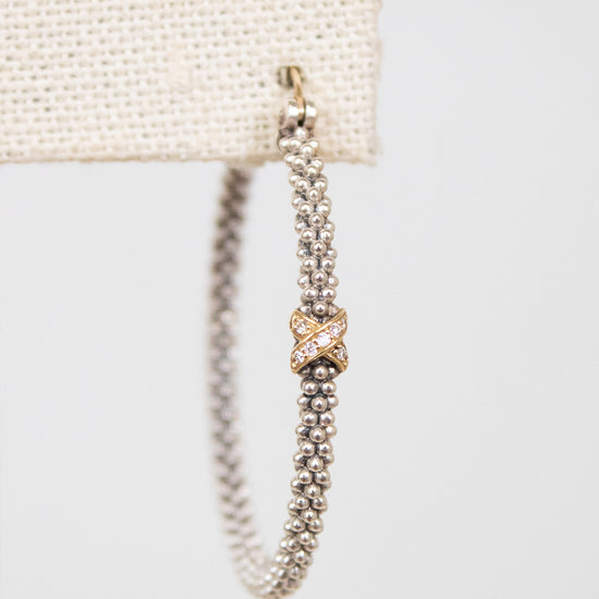 Earrings with a gold accent on a white background
