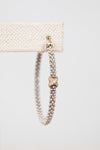 Earrings with a gold accent on a white background