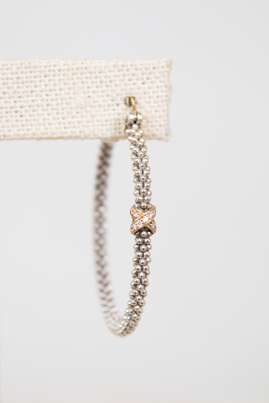 Earrings with a gold accent on a white background