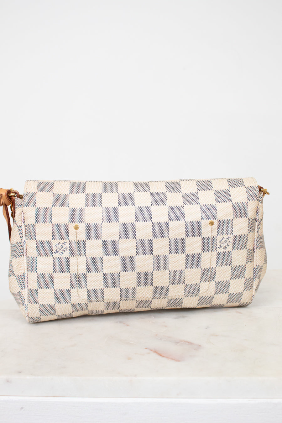 Checkered handbag on a white background