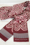 Louis Vuitton scarf with patterned design on a white background