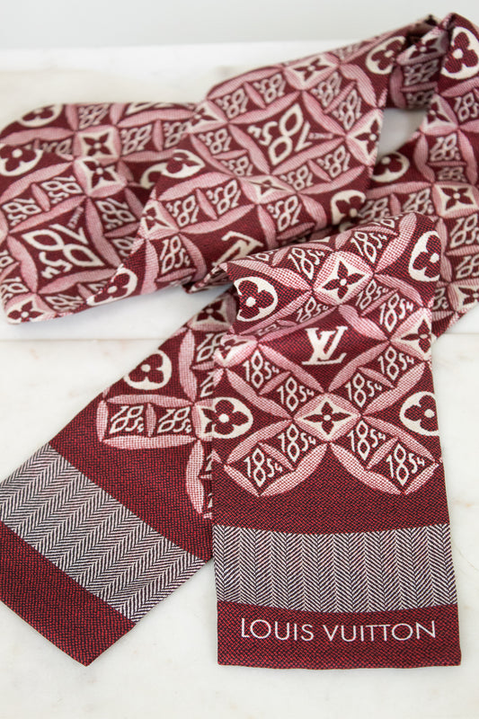 Louis Vuitton scarf with patterned design on a white background