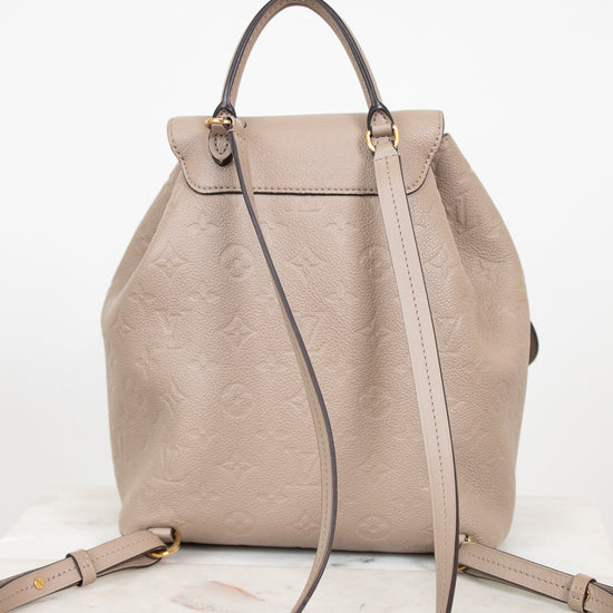 Beige backpack with a strap on a white background