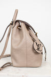 Beige handbag with a brand logo on a white background
