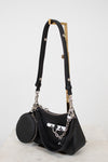 Black handbag with a chain detail on a white background
