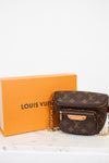 Louis Vuitton monogram handbag with orange box on a white background