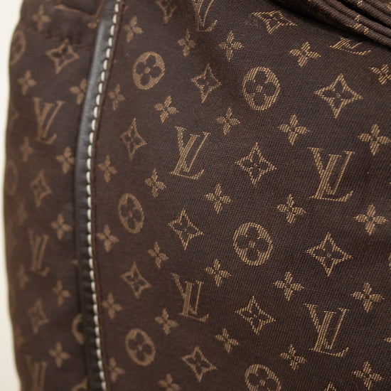 Brown bag with monogram pattern on a white background