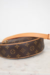 Louis Vuitton monogram handbag on a marble surface