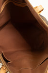 Close-up of a brown bag with visible stitching