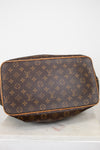 Brown Louis Vuitton monogram bag on a white background