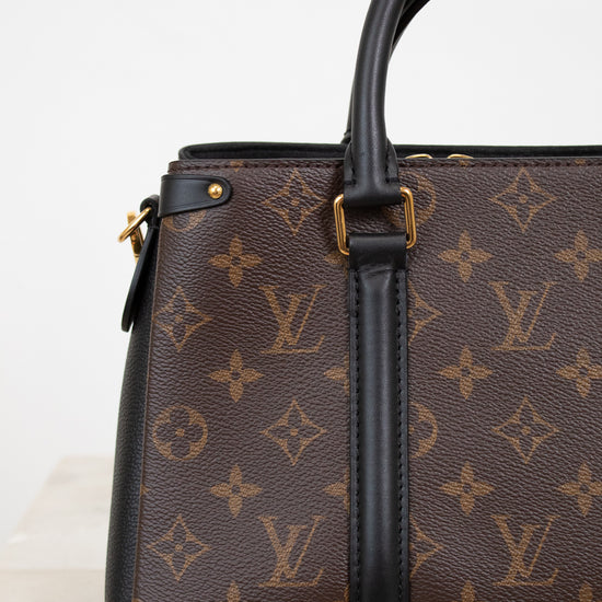 Louis Vuitton handbag with monogram pattern on a light background