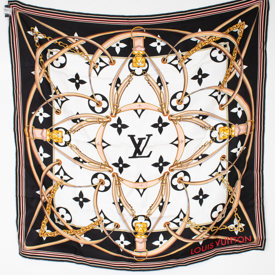 Louis Vuitton scarf with intricate design and logo on a white background