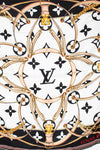 Louis Vuitton scarf with brand logo and decorative patterns