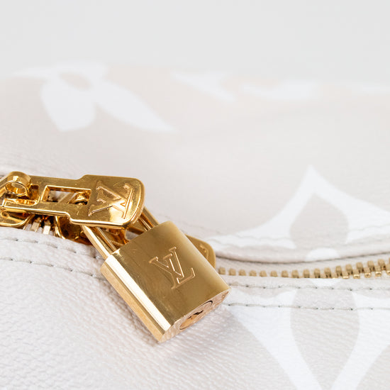 Gold padlock with a visible brand logo on a white textured background