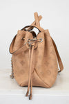 Tan leather drawstring bag with brand logo on a white background