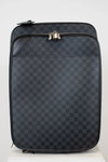 Black checkered suitcase with silver zippers on a white background