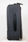 Black checkered patterned suitcase with a handle on a white background