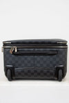 Black checkered suitcase with wheels on a white background
