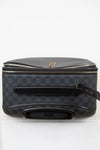 Black checkered suitcase with silver zipper pull on a white background