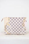 Checkered pouch with gold chain design on a white background