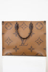 Brown leather bag with brand logo on a white background