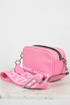 Pink handbag with 'Marc Jacobs' branding on a light background
