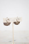 Pair of earrings on a white background