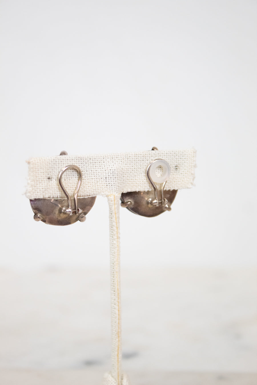 Pair of earrings on a white background