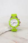 Green watch with a white face on a marble surface