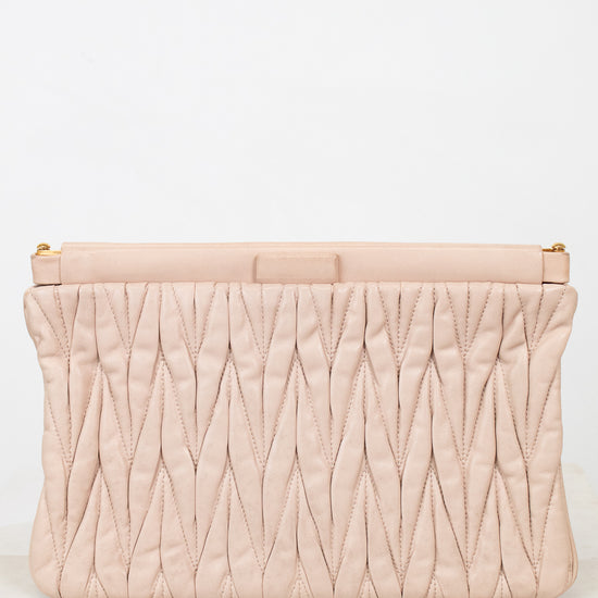 Quilted clutch bag on a light background