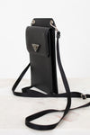 Black crossbody bag with Prada logo on a white background