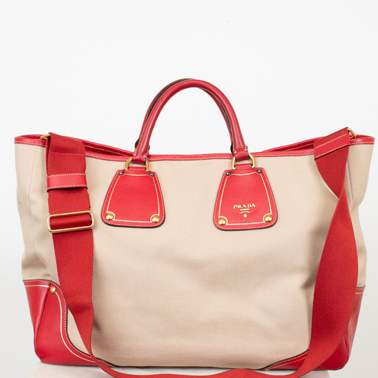 Red and beige handbag on a white background