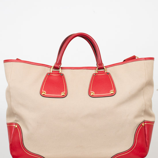 Beige tote bag with red accents on a white background