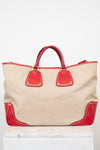Beige tote bag with red accents on a white background