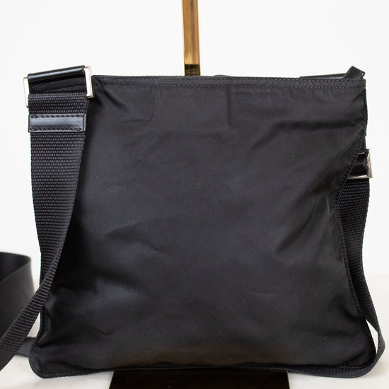 Black shoulder bag on a white background