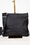 Black shoulder bag on a white background