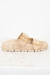 Beige sandal with gold buckles on a white background